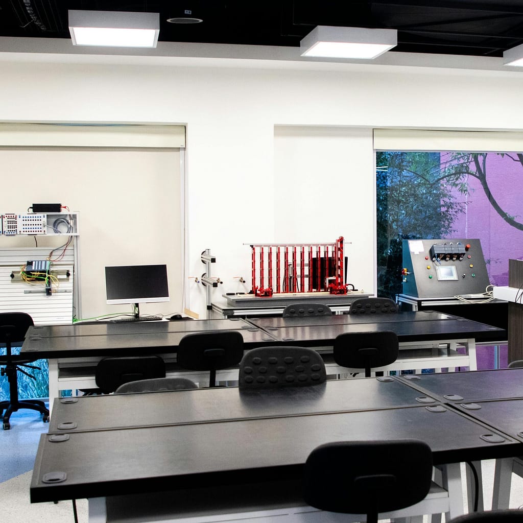 Contemporary lab interior with desks and equipment, perfect for educational purposes.